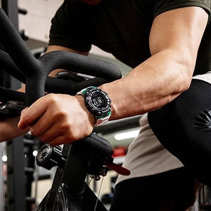 Casio G-Shock GBD-100SM-1A7ER worn on wrist while cycling, gym lifestyle shot