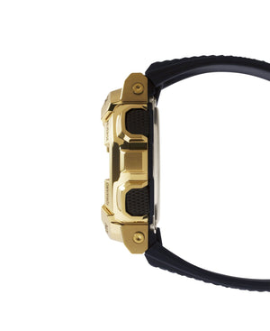 Casio G-Shock GM-110G-1A9ER side profile close-up of gold-tone buttons and case