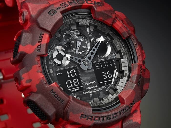 Casio G-Shock GA-100CM-4AER close-up of dial and red camouflage bezel