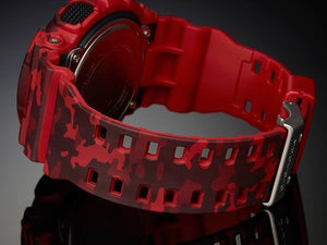 Casio G-Shock GA-100CM-4AER case-back and camouflage strap detail on dark background