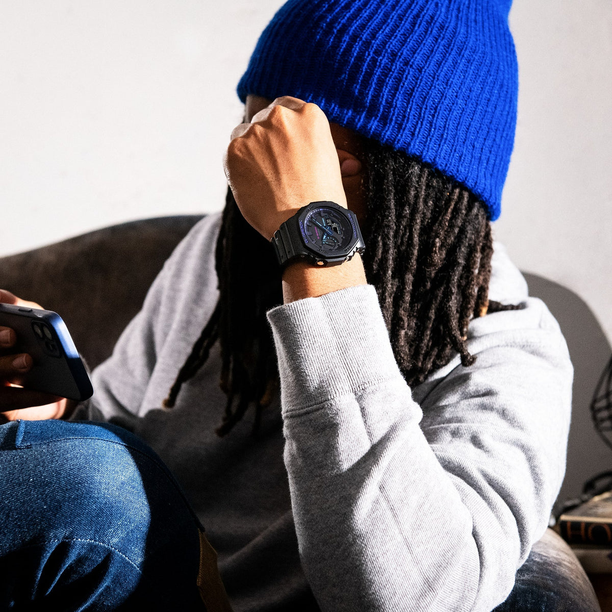 Casio G-Shock GA-2100VB-1AER watch worn on wrist, casual lifestyle shot