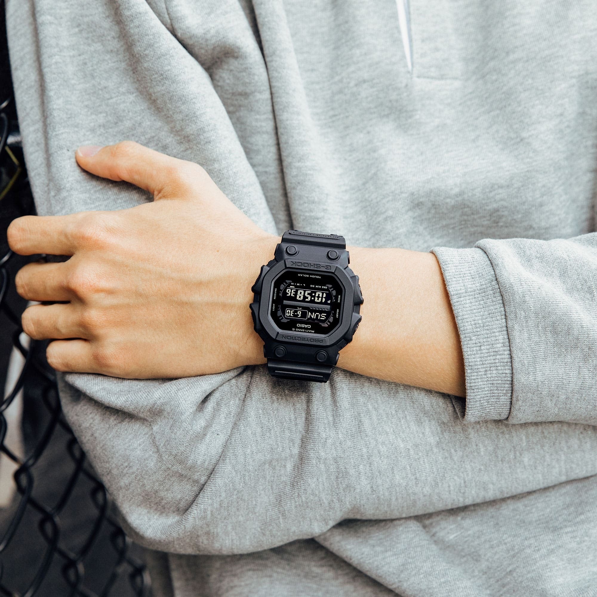 Casio G-Shock GX-56BB-1DR worn on wrist, casual lifestyle shot
