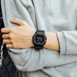 Casio G-Shock GX-56BB-1DR worn on wrist, casual lifestyle shot